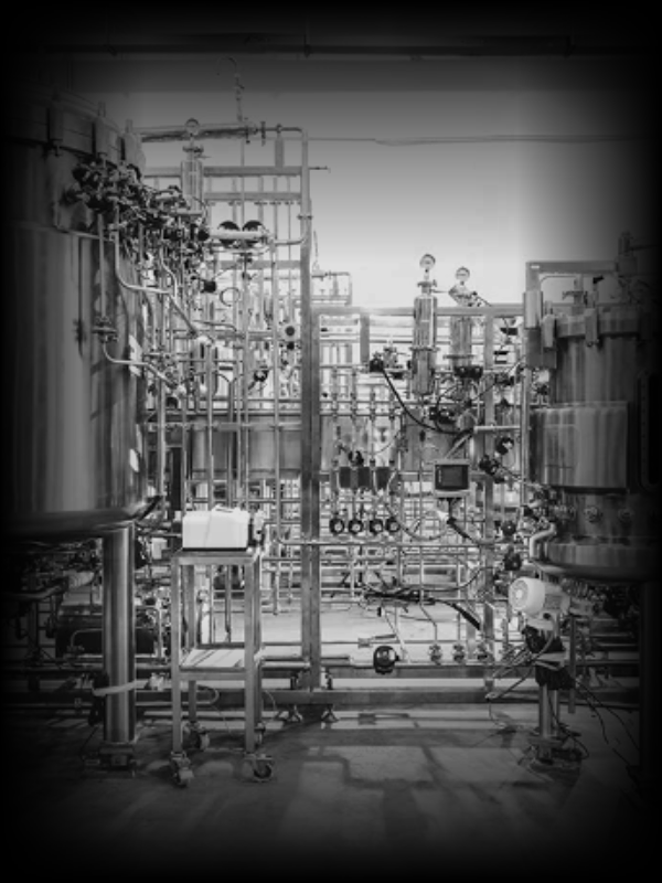 A conventional plant floor, dense with vessels and pipework